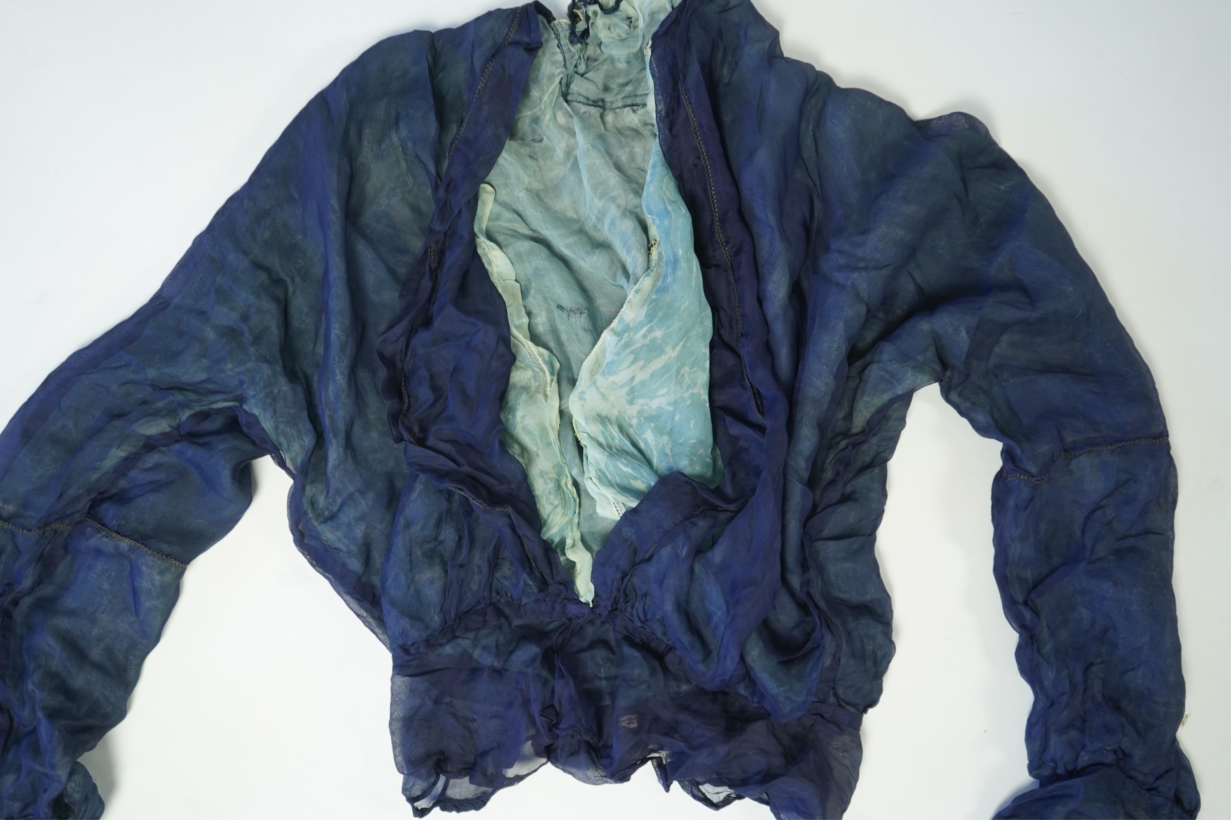 A 1940’s-50’s short sleeve lime green silk embroidered blouse, a pale pink silk crepe long sleeved blouse with white lace and a late 19th century navy silk chiffon blouse. Condition - the navy blouse is fragile but may b